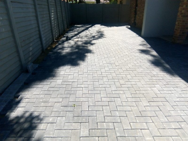 Grey bevel bond herringbone driveway in Alberton