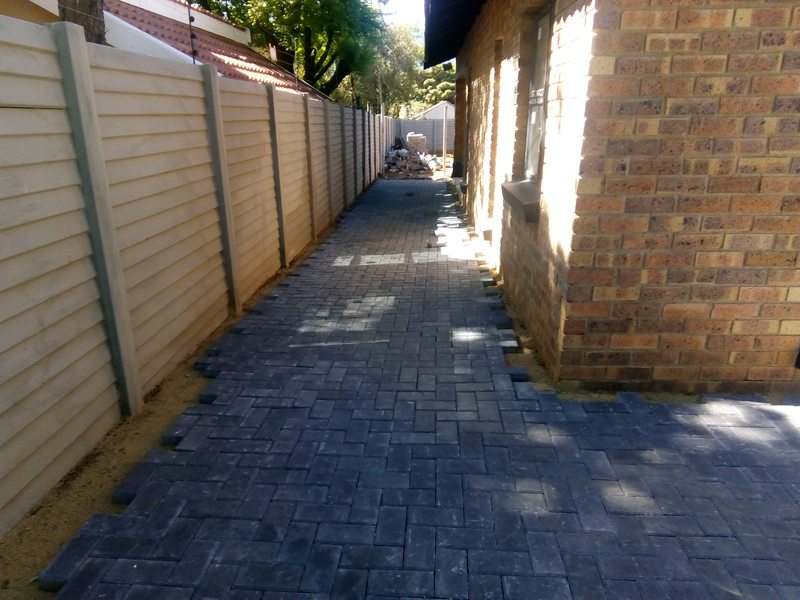 Charcoal herringbone pathway and driveway in Alberton