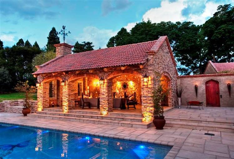 Flagstone paving with natural stone wall cladding
