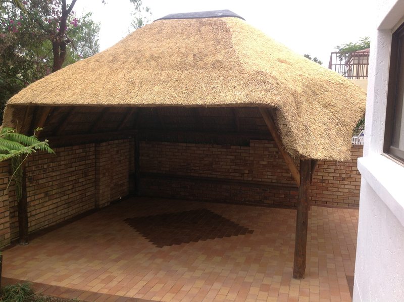 Clay paving under thatched lapa in Alberton